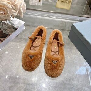 Prada Tan Fur Flats